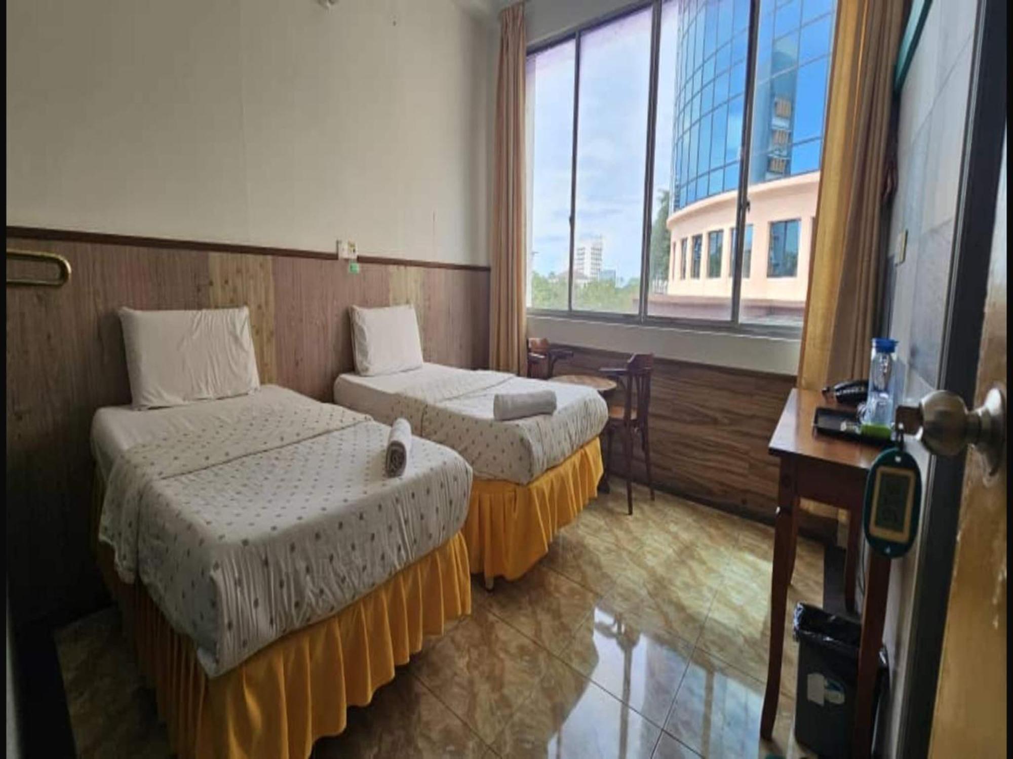 Oyo 90979 Sianglory Inn Kota Kinabalu Extérieur photo